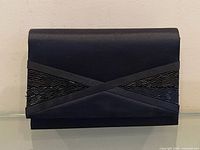 Front view showing satin body and sequin chevron design