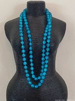 Necklace displayed doubled on bust