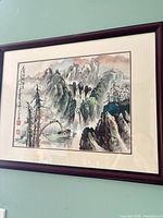 Front view of framed artwork showing image, mat and frame