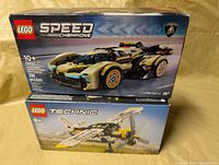 Front view of both sealed LEGO boxes stacked showing set numbers 76923 and 42198