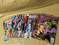 Front view showing fan-spread of all 30 bagged comics