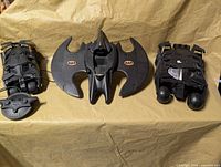Three Batman vehicles: wired RC Tumbler, Batwing, second Batmobile