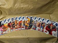 All thirteen Avengers vs. X-Men issues laid out 0-12