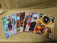 Fanned layout showing eight Convergence comics with visible issue numbers and cover art