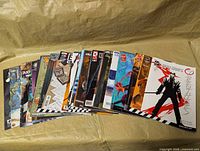 All 30 comics fanned out showing front covers