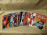 All 30 comics fanned out on surface