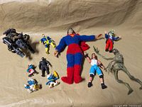 Group shot of all nine figures on surface