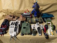 Overall group shot of all GI Joe vehicles and accessories