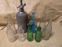 Group of all bottles and siphon