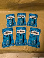Six blister-packed Listerine Pocketmist sprays displayed