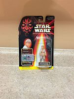 Front view of sealed Anakin Skywalker Episode I figure on card