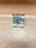Front view of sealed Upper Deck MVP 2025-26 hockey blaster box on countertop.