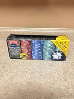 Front of Bicycle poker chip set box showing four chip colours