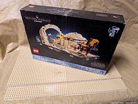 Front of sealed LEGO Star Wars set 75380 box showing damage