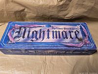 Front view of Nightmare board game box showing title artwork