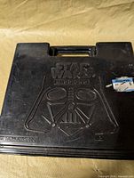 Closed black Star Wars Missions case front view