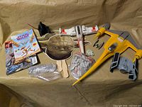 Overall view of books, figures, starfighters, tokens