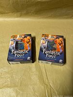 Front view showing two sealed Fantastic Four starter deck boxes