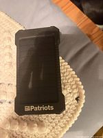 Front view showing 4Patriots logo and solar panel surface