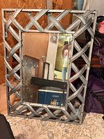 Front view of silver lattice wall mirror