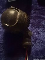 Front angled view of sensor showing domed lens and mounting joint