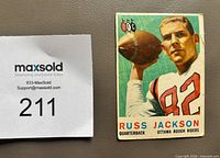Front view of Russ Jackson rookie card showing image, text and wear