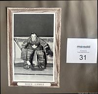 Front view of Beehive Bruce Gamble cardboard photo with printed border