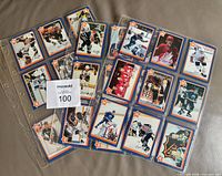 Two binder pages showing multiple Gretzky cards