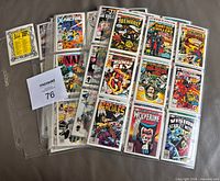 Cards in nine-pocket pages plus extra page stack showing set