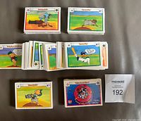 Overall view showing stacks of loose cards and sealed decks