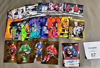 All 35 hockey cards laid out showing fronts and subsets