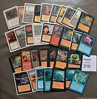 All 35 Magic cards fanned out face-up showing variety and duplicates
