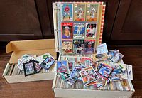 Overall view of binder, two storage boxes and loose baseball cards