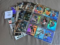 Front view showing assortment of holographic Gretzky insert cards in binder pages
