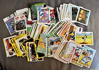 Pile showing mix of Batman, Looney Tunes, Dick Tracy and other series cards