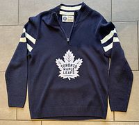 Front view of navy Toronto Maple Leafs sweater