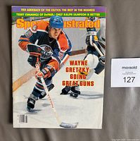 Front cover showing Wayne Gretzky skating in Oilers uniform