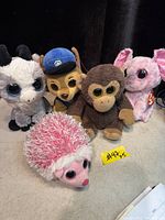 Group of five Ty Beanie Boos plush toys showing variety of characters