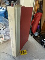 Spine and boards of the hardcover book showing title, author, and overall condition