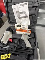 Contents of lot inside carry case: brad nailer, nails, manual, blow gun
