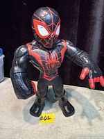 Front view of Miles Morales Spider-Man 10" action figure showing overall design and condition