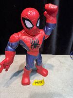 Front view of 10" Spider-Man figure showing pose and chest emblem