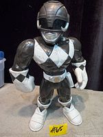 Front view of Black Ranger figure showing details and height tag
