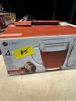 Factory box front showing Libbey branding, capacity, set quantity
