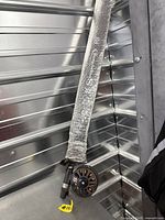 Rod and reel in bubble wrap showing overall set