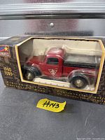 Boxed Canadian Tire 1940 Ford die-cast bank truck front view