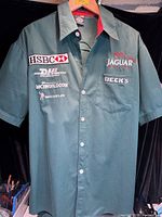 Full front view of Jaguar Racing shirt hanging