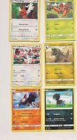Six cards including Fletchling, Paras, Vigoroth, Fraxure, Gliscor, Deino