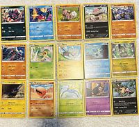 Grid shot showing all 15 Pokémon cards