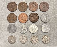 All 16 coins arranged in four-by-four grid